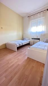 Postel nebo postele na pokoji v ubytování Apartment Barbin