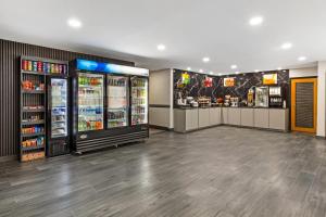a grocery store with two refrigerators and drinks at Quality Inn Washington NC in Washington