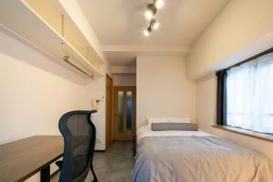 Postel nebo postele na pokoji v ubytování Work Friendly Room 3 min to Station Simmons Bed WiFi and Desk
