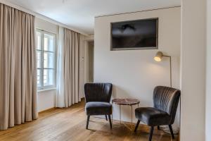 Telewizja i/lub zestaw kina domowego w obiekcie Boutiquehotel Amadeus