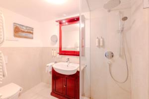 Łazienka w obiekcie Boutiquehotel Amadeus