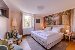 Łóżko lub łóżka w pokoju w obiekcie Boutiquehotel Amadeus