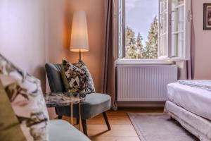 Łóżko lub łóżka w pokoju w obiekcie Boutiquehotel Amadeus