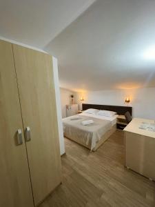 Postel nebo postele na pokoji v ubytování Casa Isabel Constanta