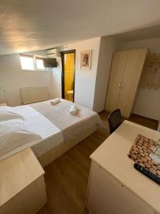 Postel nebo postele na pokoji v ubytování Casa Isabel Constanta