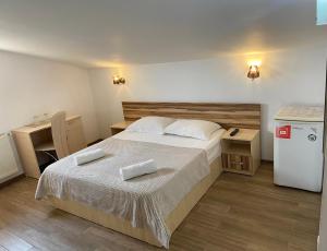 Postel nebo postele na pokoji v ubytování Casa Isabel Constanta