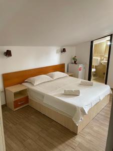 Postel nebo postele na pokoji v ubytování Casa Isabel Constanta