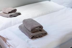 Ένα ή περισσότερα κρεβάτια σε δωμάτιο στο Apartament Sosnówka B2 morsowanie i SPA