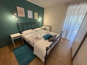 Postel nebo postele na pokoji v ubytování Apartment Dori