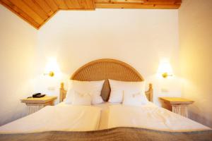 Ein Bett oder Betten in einem Zimmer der Unterkunft Hotel Antoniushütte