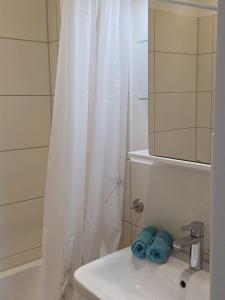 Koupelna v ubytování Wohnung mit Garagenplatz am Obinger See