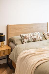 Voodi või voodid majutusasutuse Hop Nest Žatec centrum apartment toas