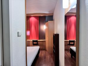 Postel nebo postele na pokoji v ubytování a&o Hostel Milano Ca Granda
