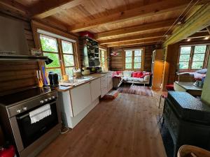 Η κουζίνα ή μικρή κουζίνα στο Guesthouse with amazing location +10 φωτογραφίες