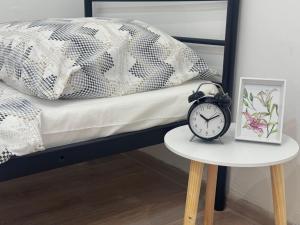 Postel nebo postele na pokoji v ubytování Perfekt group