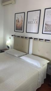 Postel nebo postele na pokoji v ubytování Casa Ulisse