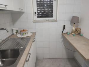 Cucina o angolo cottura di Bellissimo attico a 70 mt dalla spiaggia