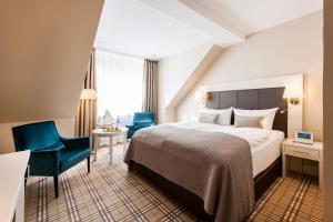 Postel nebo postele na pokoji v ubytování Hotel Birke, Ringhotel Kiel