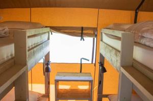 Postel nebo postele na pokoji v ubytování Camping Campo dei Fiori - Glamping4all