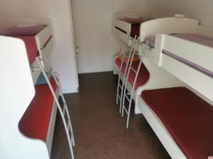 Postel nebo postele na pokoji v ubytování Stars Aspava Blue HOSTEL