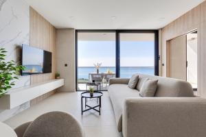 TV a/nebo společenská místnost v ubytování Apartina Boutique Suites + 37 fotografií