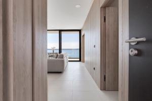 Postel nebo postele na pokoji v ubytování Apartina Boutique Suites