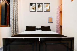 Posteľ alebo postele v izbe v ubytovaní Hotel O G.D Guest House