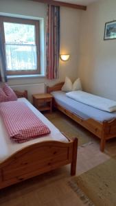 Postel nebo postele na pokoji v ubytování Nieslerhof + 36 fotografií