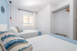 Cama o camas de una habitación en Canyamel A