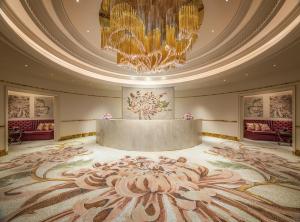 Voodi või voodid majutusasutuse Palazzo Versace Macau toas