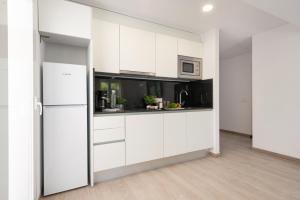 Una cocina o zona de cocina en Canyamel A