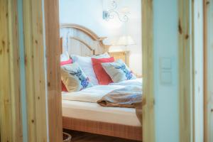 Postelja oz. postelje v sobi nastanitve Luxus-Lodge Kaiser Franz Josef im SCHILLER