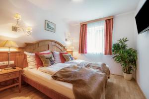 Postelja oz. postelje v sobi nastanitve Luxus-Lodge Kaiser Franz Josef im SCHILLER