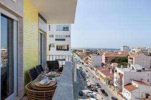 Balkón nebo terasa v ubytování Bright Coastal Retreat in Costa da Caparica