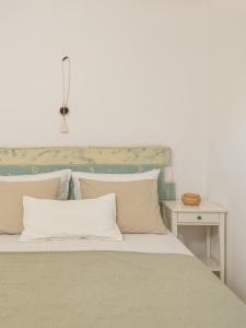 Ein Bett oder Betten in einem Zimmer der Unterkunft Serifos Dream Houses near the sea