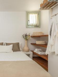 Ein Bett oder Betten in einem Zimmer der Unterkunft Serifos Dream Houses near the sea