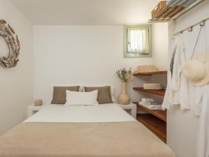 Ein Bett oder Betten in einem Zimmer der Unterkunft Serifos Dream Houses near the sea