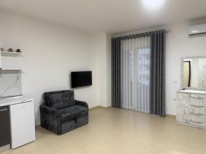 TV a/nebo společenská místnost v ubytování MEGAN RESIDENCE - floor 3