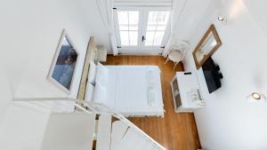 TV a/nebo společenská místnost v ubytování Cunda Piano Otel