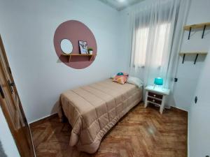 Posteľ alebo postele v izbe v ubytovaní Casa Loli - solo familias y parejas
