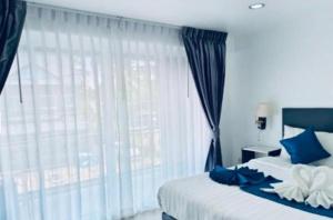 Postel nebo postele na pokoji v ubytování Hacia in box hotel