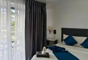 Postel nebo postele na pokoji v ubytování Hacia in box hotel + 3 fotografie