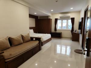 Letto o letti in una camera di A and M Rooms and Residences