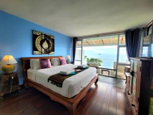Postel nebo postele na pokoji v ubytování Koh Chang Cliff Beach Resort