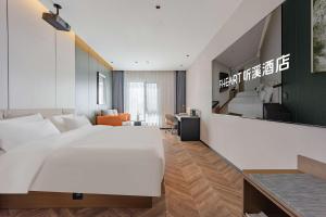 TV a/nebo společenská místnost v ubytování Tingxi Hotel