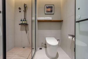 Koupelna v ubytování Tingxi Hotel
