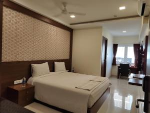 Letto o letti in una camera di A and M Rooms and Residences