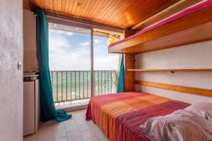 Postel nebo postele na pokoji v ubytování Porte Rouge 4