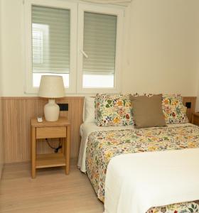 Ένα ή περισσότερα κρεβάτια σε δωμάτιο στο Carvajales +7 φωτογραφίες