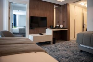 TV a/nebo společenská místnost v ubytování Hotel Rubin DHS